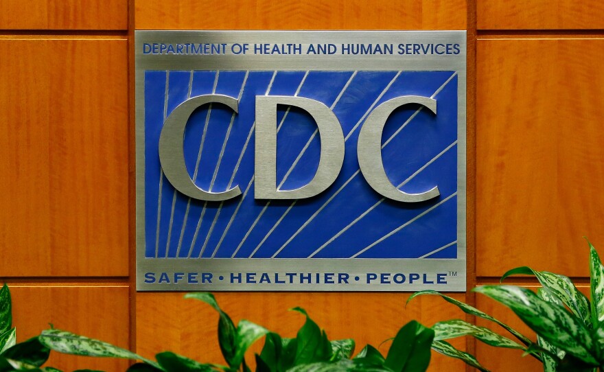 A podium with the logo for the Centers for Disease Control and Prevention at the Tom Harkin Global Communications Center in Atlanta.