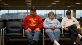 On call 24 hours a day for the past five years, a group of senior citizens has made history by greeting nearly 800,000 American troops at a tiny airport in Bangor, Maine. “The Way We Get By,” airing on Veterans Day, is an intimate look at three of these greeters as they confront the universal losses that come with aging and rediscover their reason for living. Pictured (l-r): Jerry Mundy, Joan Gaudet and Bill Knight at Bangor International Airport.