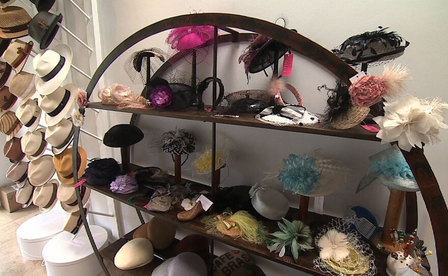 A rack of fascinators and pillbox hats sit in Jill Courtemanche's Solana Beach shop, June 25, 2015.