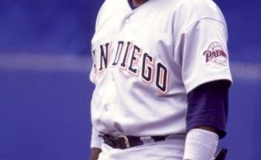 Tony Gwynn smiles after reaching base on a hit.