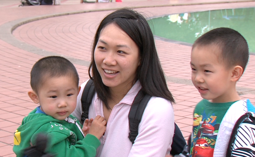 San Diegan My Ly spends some time in Balboa Park with her two boys after struggling to find a place to park, July 7, 2015.