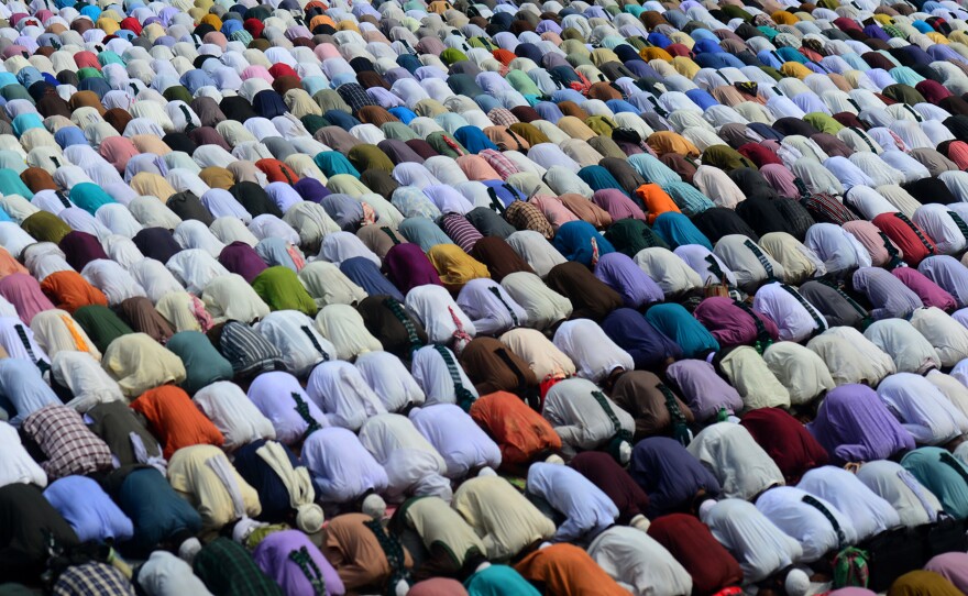 Faithful in Bangladesh offer Friday prayers during a street protest in the capital, Dhaka, in March.