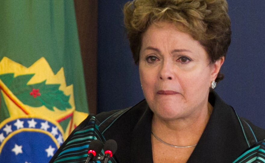 Brazil's President Dilma Rousseff begins to cry as she delivers a speech during the final report of the National Truth Commission on Violation of Human Rights during the military dictatorship from 1964-1985 in Brasilia on Wednesday. She is among the thousands who were tortured during that brutal period.