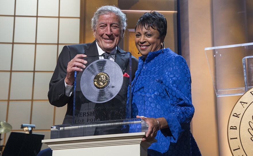 Honoree Tony Bennett with Librarian of Congress Carla Hayden as she presents the Library of Congress Gershwin Prize for Popular Song.