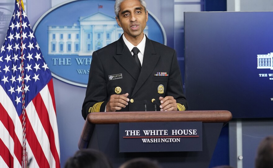 U.S. Surgeon General Dr. Vivek Murthy speaks during the daily briefing at the White House in Washington. Murthy says that he and the rest of his immediate family have tested positive for COVID-19.