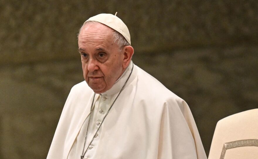 Pope Francis stands during the weekly general audience on March 30 at the Vatican.
