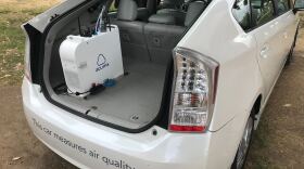 A Prius with special gear in the trunk that allows it to sample air while driving on San Diego County roads in Barrio Logan's Chicano Park on May 5, 2019 
