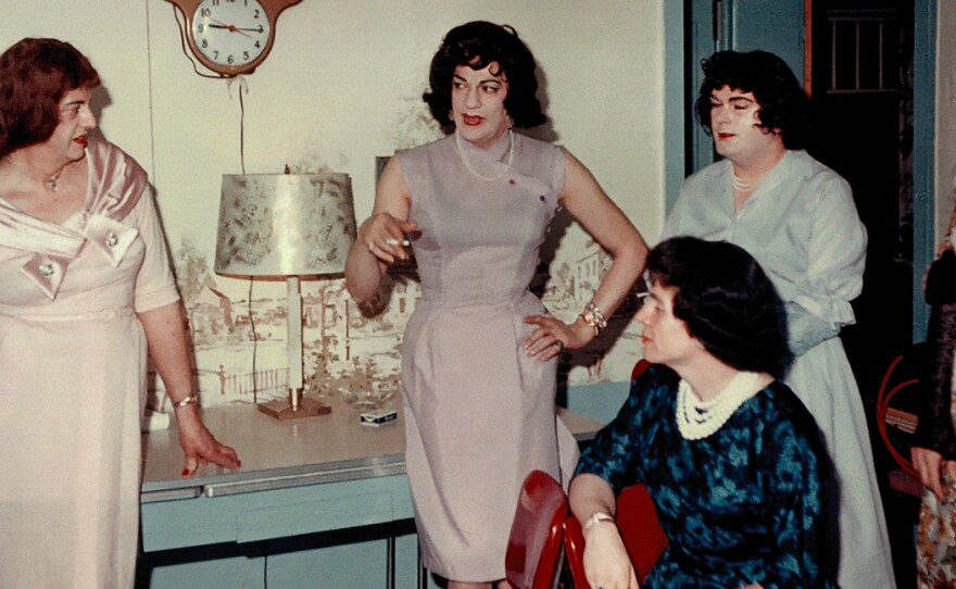 Susanna (center) and four guests in Casa Susanna's living room. Circa 1962. 