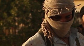 Promotional still from the film "Held Hostage," a new one-hour documentary special on PBS, which details for the first time the real and full story behind the al-Qaeda-affiliated terrorist attack in Algeria on the In Amenas gas facility, which was jointly operated by Algerian and European energy companies, including BP. 