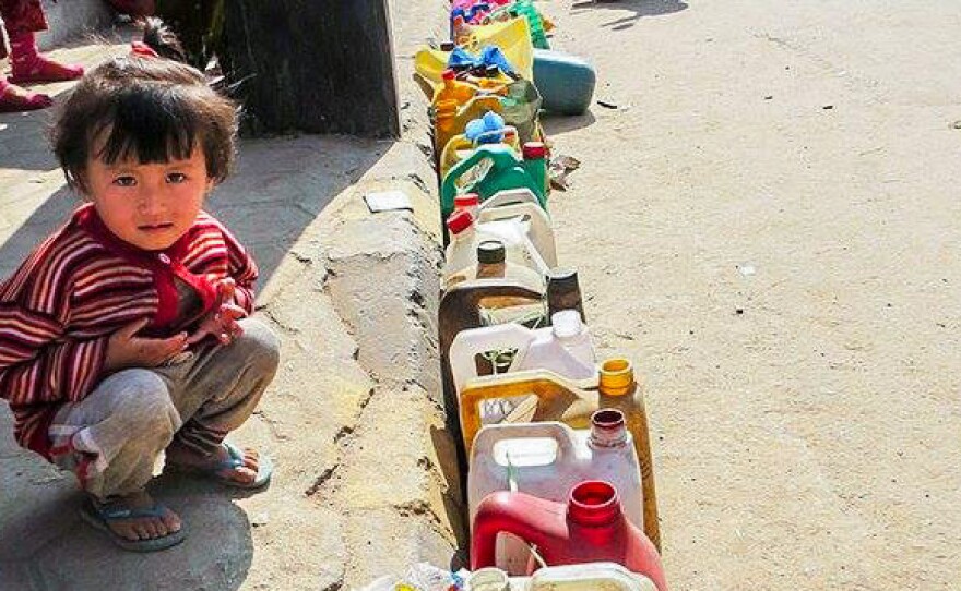 During the months-long fuel crisis, people had to wait in long lines to buy diesel and propane.