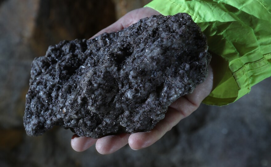 A rock of Zinnwaldite, a silicate mineral that contains lithium, from a mine near Altenberg, Germany, is shown on Dec. 13, 2017.