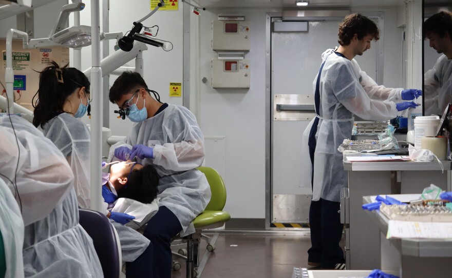Dental students with the University of Southern California run a mobile clinic at a North San Diego County school on Tuesday, July 22, 2025.