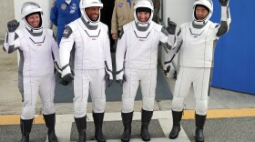 NASA astronauts, from left, Shannon Walker, Victor Glover, and Michael Hopkins and Japan Aerospace Exploration Agency astronaut Soichi Noguchi leave the Operations and Checkout Building on their way to launch pad 39A for the SpaceX Crew-1 mission to the International Space Station at the Kennedy Space Center in Cape Canaveral, Fla., Sunday, Nov. 15, 2020.
