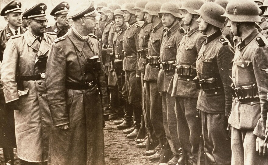 A June 3, 1944, photo provided by the U.S. Holocaust Memorial Museum shows SS chief Heinrich Himmler (center) as he reviews troops of the Galician SS-Volunteer Infantry Division.