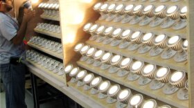 Lighting Science Group, a small Florida-based company selling its bulbs at Home Depot, is the first firm to manufacture an LED, which costs less than $20 and produces as much light as a 40-watt incandescent bulb.