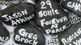 Chunks of coal bear the names of the miners who died in the April 5 explosion at the Upper Big Branch coal mine in Montcoal, W.Va.