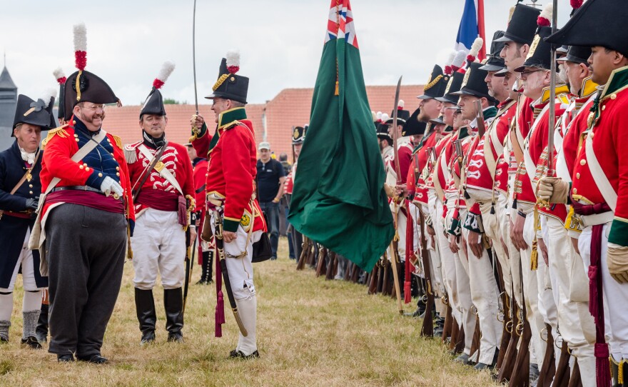 Re-enactors prepare to commemorate the 200th anniversary of Battle of Waterloo in Belgium on Friday. Some 5,000 re-enactors, 300 horses and 100 canons are taking part over two days.