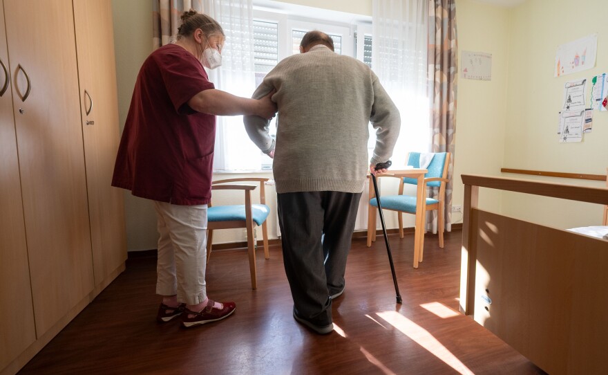 The Biden administration is establishing new standards for how much time each day a nursing home resident gets direct care from a nurse or an aide.