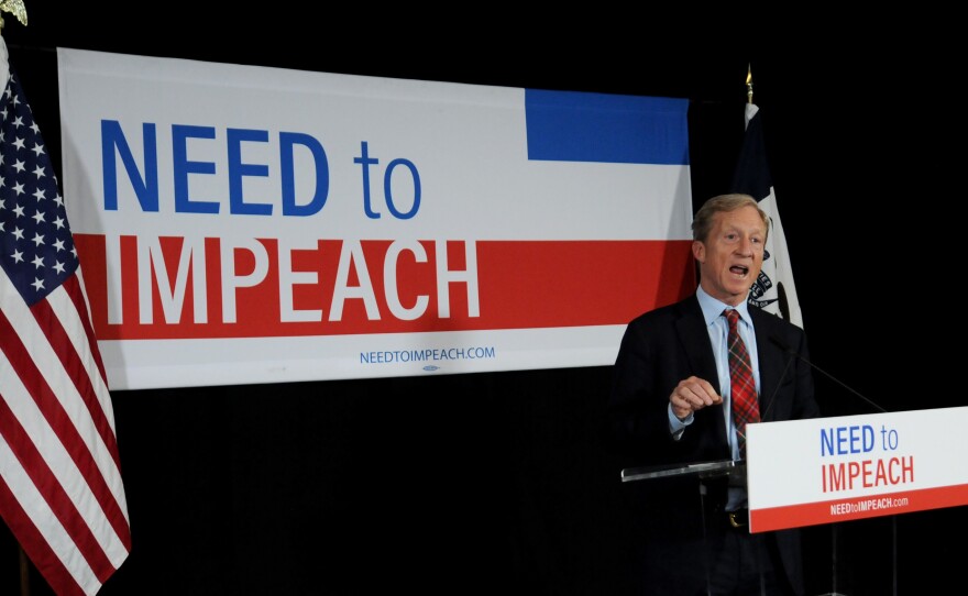 Billionaire activist Tom Steyer speaks to supporters in January in Des Moines, Iowa, where he announced he would not run for president. He's now reversed course.