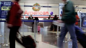 Passengers walk to the TSA check-in inside the American Airlines terminal at Chicago's O'Hare International Airport on Nov. 25. Aviation experts say even if the weather cooperates, passengers should be prepared for crowded flights over the Christmas and New Year's holidays.