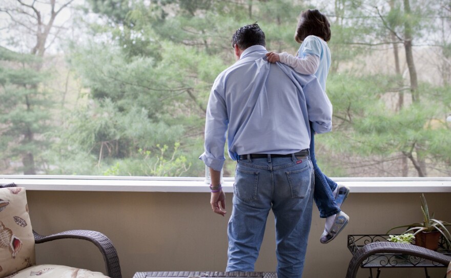 Isabelle and her dad look for wildlife in the woods. Isabelle's disorder means that her parents, as well as teachers at school, have to constantly monitor her to make sure strangers aren't taking advantage of her.