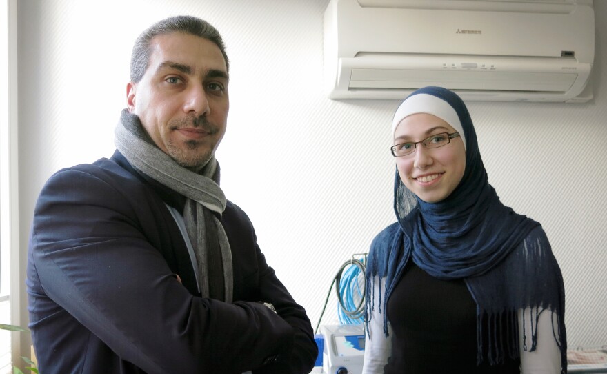 Born in Syria, Mousllie (shown here with his 17-year-old daughter, Sarah) came to Germany more than 20 years ago and is now a German citizen.