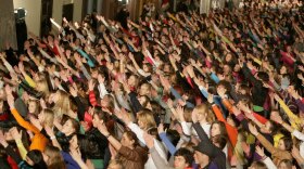 Flash mob dancers perform on Pilies street in the Old Town of Vilnius, Lithuania, late on April 19. More than 700 flash dancers participated in the event.