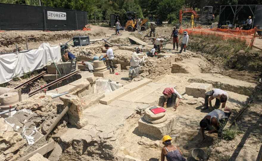 Archaeologists work at the site of an ancient thermal spring in San Casciano dei Bagni, Italy, on July 29.