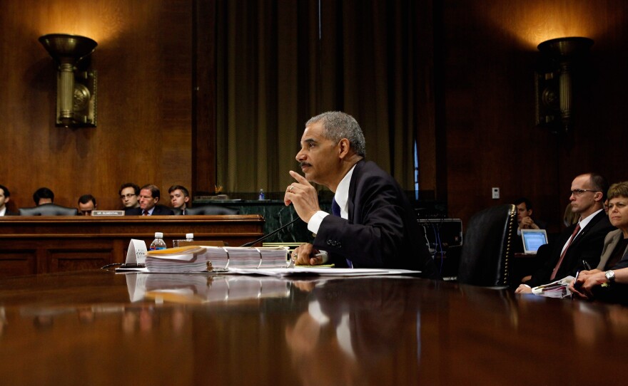 U.S. Attorney General Eric Holder answers questions in June 2012 while testifying before the Senate Judiciary Committee on Capitol Hill in Washington, DC. He faced questions about the ongoing Operation Fast and Furious investigation, his decision to order two federal prosecutors to begin criminal investigations into a series of national security leaks to the news media, and other subjects.