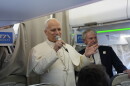 Pope Leo XIV talks to journalists aboard the papal flight from Rome to Madrid on June.