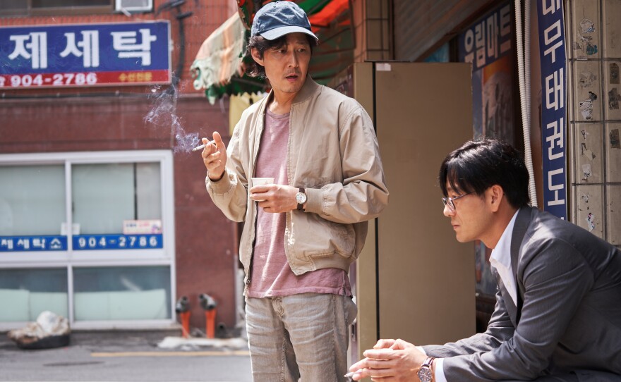 Gi-Hun and Sang-woo