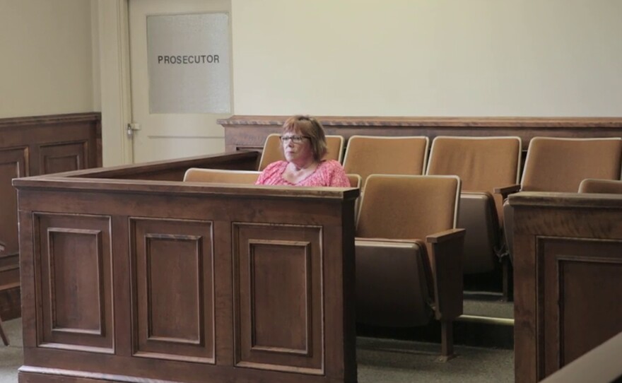 Lindy Lou, sitting in the jury box, in "Lindy Lou," Juror Number Two