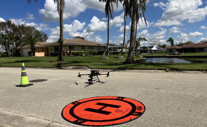 A drone being used by Alachua County Fire Rescue surveys hurricane damage in the Cypress Lake neighborhood of Fort Myers, Fla., on Saturday. David Merrick, director of the Florida State University Center for Disaster Risk Policy, coordinates the state's drone reconnaissance.