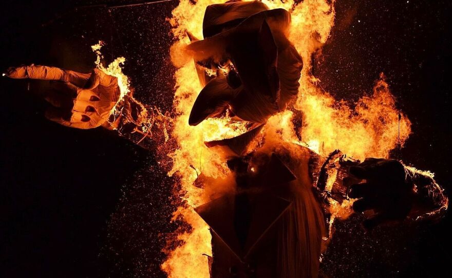 This year's ghastly Zozobra, going up in flames.