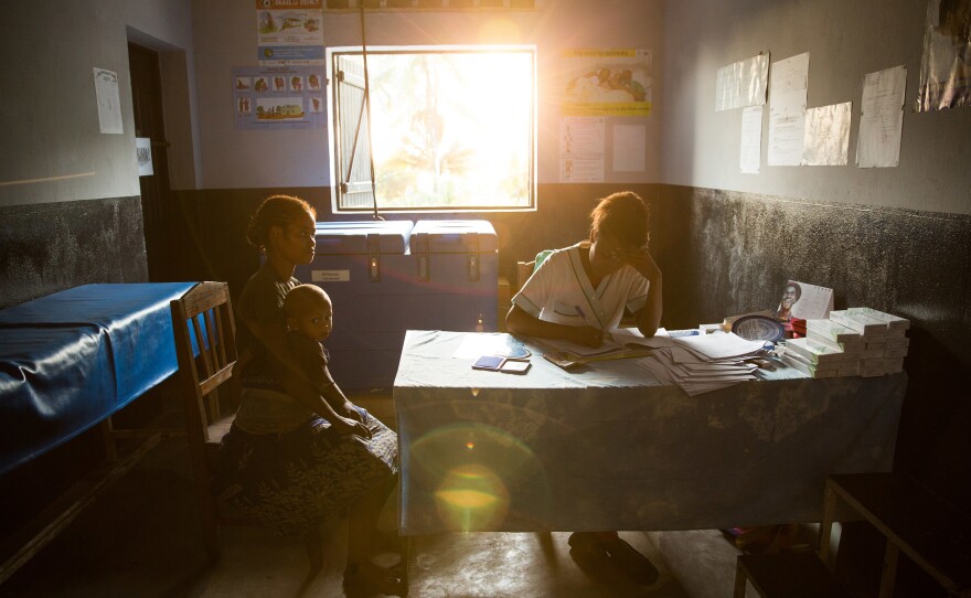 A patient talks with a nurse at a traveling contraception clinic in Madagascar run by MSI Reproductive Choices, an organization that provides contraception and safe abortion services in 37 countries. The group condemned the overturn of <em>Roe v. Wade</em> and warned that the ruling could stymie abortion access overseas.