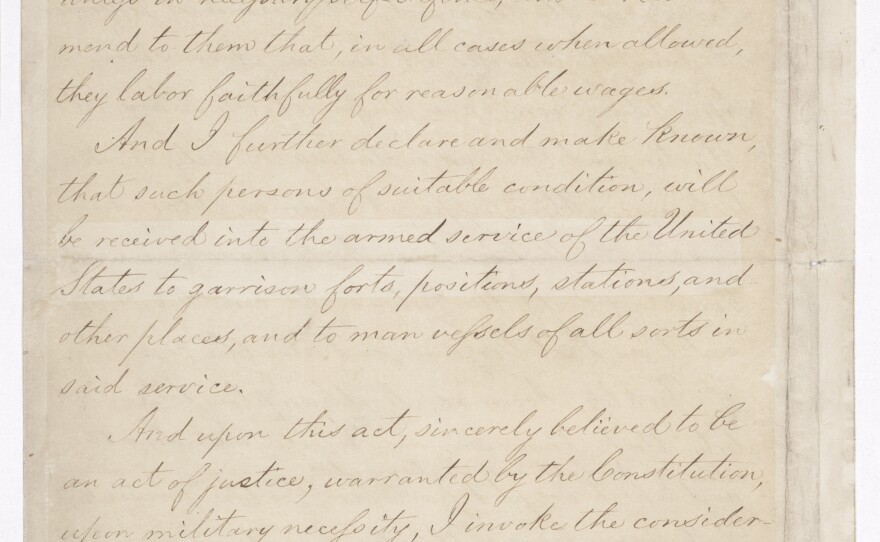 Page four of the Emancipation Proclamation on display at the National Archives in Washington, D.C.