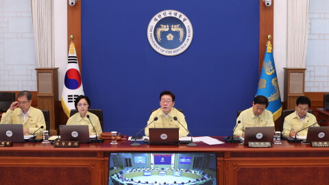 South Korean President Lee Jae Myung, center, speaks during a cabinet meeting at the presidential office in Seoul, South Korea, Tuesday, Aug. 18, 2026.