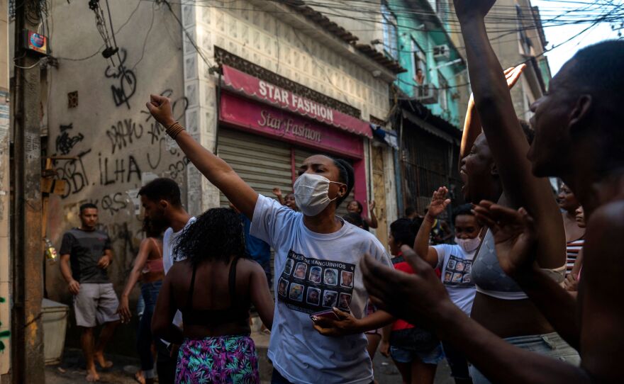 Residentes protest after a police operation against alleged drug traffickers at the Jacarezinho favela in Rio de Janeiro, Brazil, on Thursday.