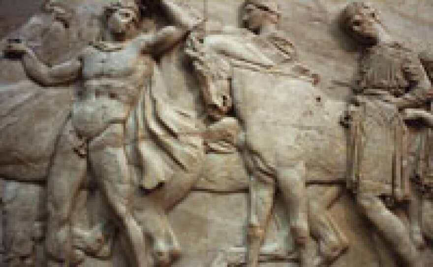On view at the British Museum in London, the Elgin Marbles were originally crafted along the outside wall of the Parthenon. Portions of the British collection depict a mythical battle. Others depict a Panathenaia Festival, an annual event of games played in honor of the goddess Athena.