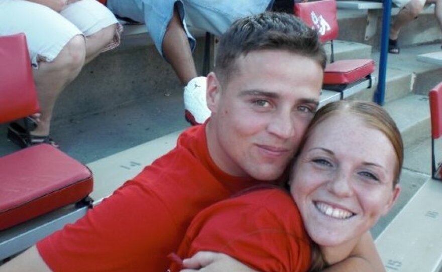 Cpl. Derek Wyatt is seen here with his wife, Kait, in Fresno, Calif., at a Fresno State football game. Wyatt was 25 when he died; his wife, 22.