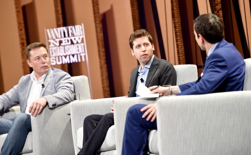 From left, Elon Musk, Sam Altman and Andrew Ross Sorkin, <em>New York Times</em> financial columnist, speak  during the Vanity Fair New Establishment Summit at Yerba Buena Center for the Arts on Oct. 6, 2015, in San Francisco.