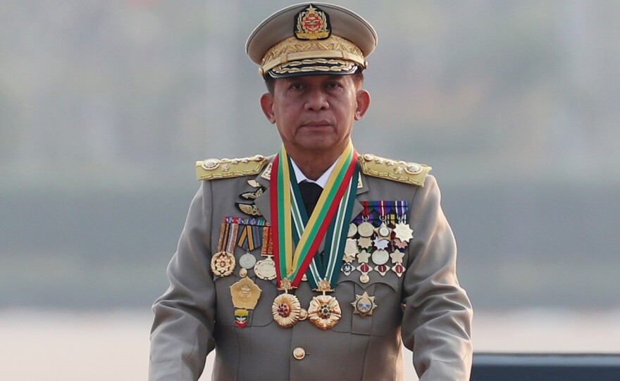 Senior Gen. Min Aung Hlaing inspects officers at a parade to commemorate Myanmar's 78th Armed Forces Day in Naypyitaw, Myanmar, March 27, 2023 — in a picture from his time as head of Myanmar's military council.