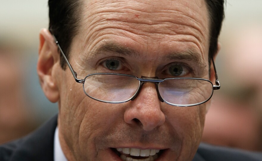 Randall Stephenson, CEO of AT&T, says his company's proposed merger with Time Warner will not hurt competition.