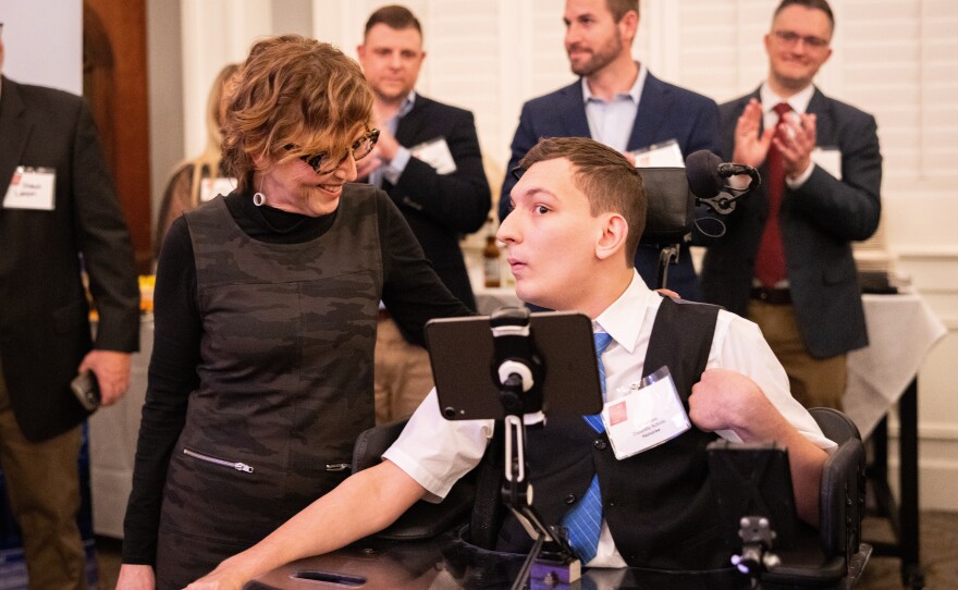 J.J. Holmes was recognized this year among the News Service of Florida's 40 under 40 for his advocacy work for people with disabilities. The News Service's Dara Kam hosted the ceremony.