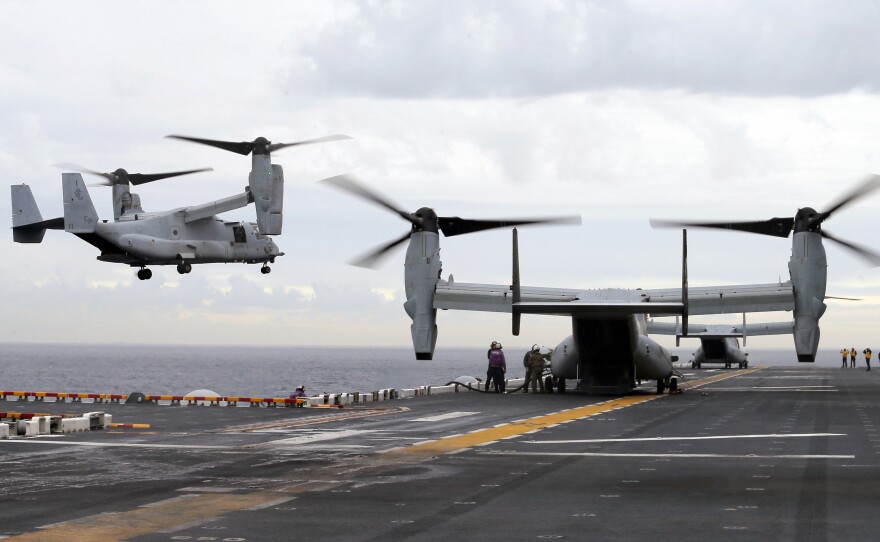 A U.S. Marine Corps MV-22B Osprey aircraft lands on the deck of the USS Bonhomme Richard amphibious assault ship last June off the coast of Sydney, Australia. An MV-22 Osprey that had launched from the USS Bonhomme was conducting regularly scheduled operations when it crashed into the water off Australia's east coast August 5.