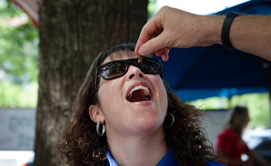 Nancy Troyano, an entomologist with Ehrlich, tried her very first insect.