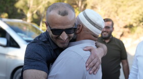 Loui Ridi, an Ohio-based Palestinian-American landlord of one of the homes besieged by Israeli settlers for over a week, arrives at his parent's home upon return from the U.S., in the occupied West Bank village of Qusra, south of Nablus, Monday, Aug. 17, 2026.