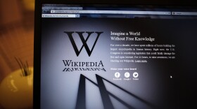 A laptop computer displays Wikipedia's front page showing a darkened logo on January 18, 2012 in London, England. The Wikipedia website has shut down it's English language service for 24 hours in protest over the US anti-piracy laws. 