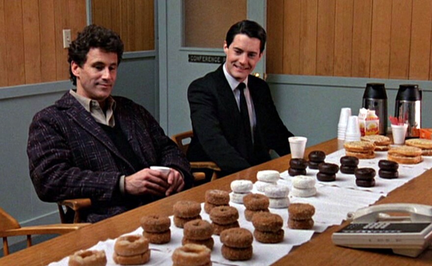 A still from the pilot episode of <em>Twin Peaks</em>, featuring Michael Ontkean as Sheriff Harry S. Truman (left) and Kyle MacLachlan as Special Agent Dale Cooper.