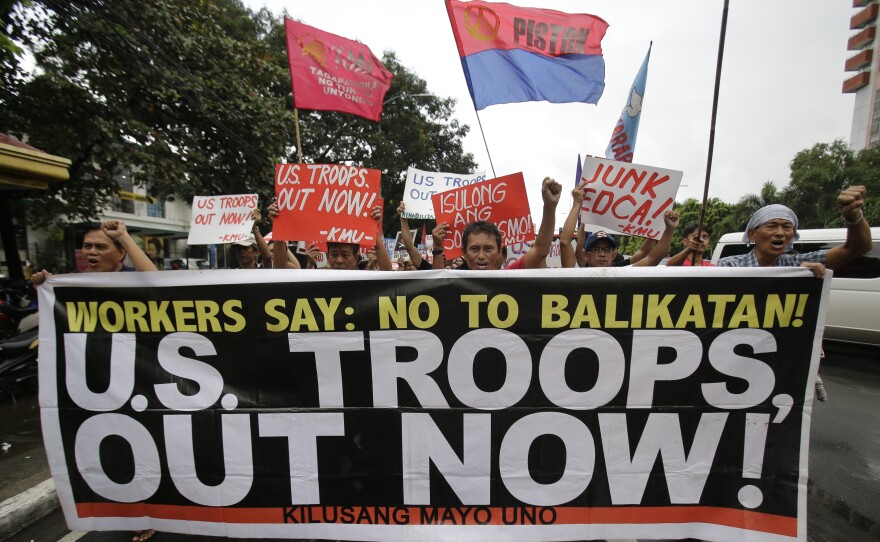 Filipino activists rally against U.S.-Philippine military exercises in a protest Tuesday outside the U.S. Embassy in Manila.